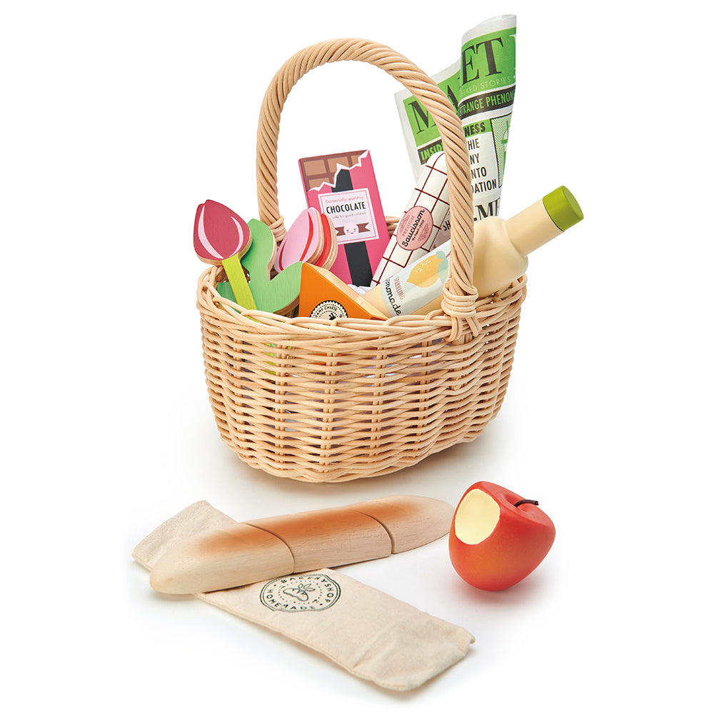 Tender Leaf wooden shopping wicker basket pretend play food set for children with newspaper, apple, lemonade chocolate flowers tulips and some cheese