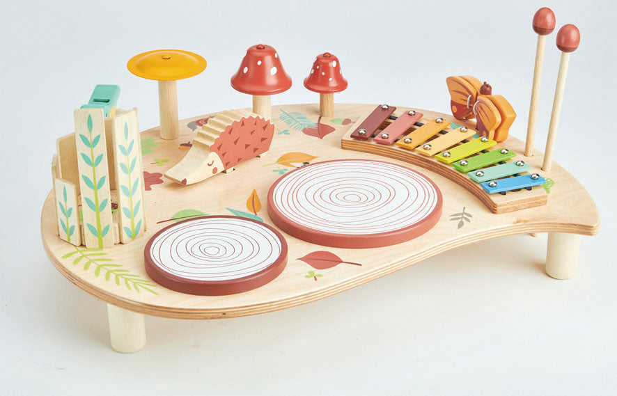 Tenderleaf wooden music tray table for children with drums bells and lots of accessories. Woodland rainbow theme