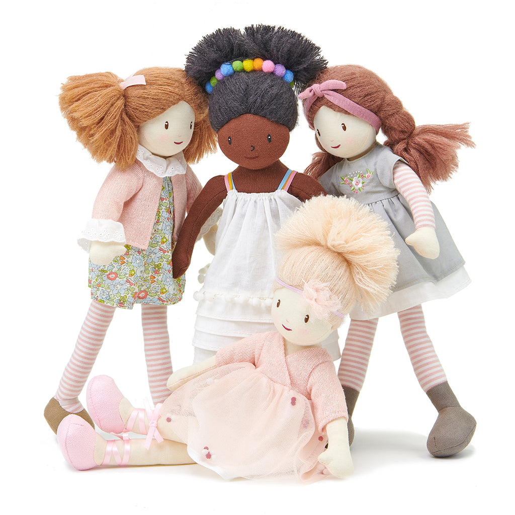 plastic-free rag soft doll with bunches and floral dress with pink cardigan