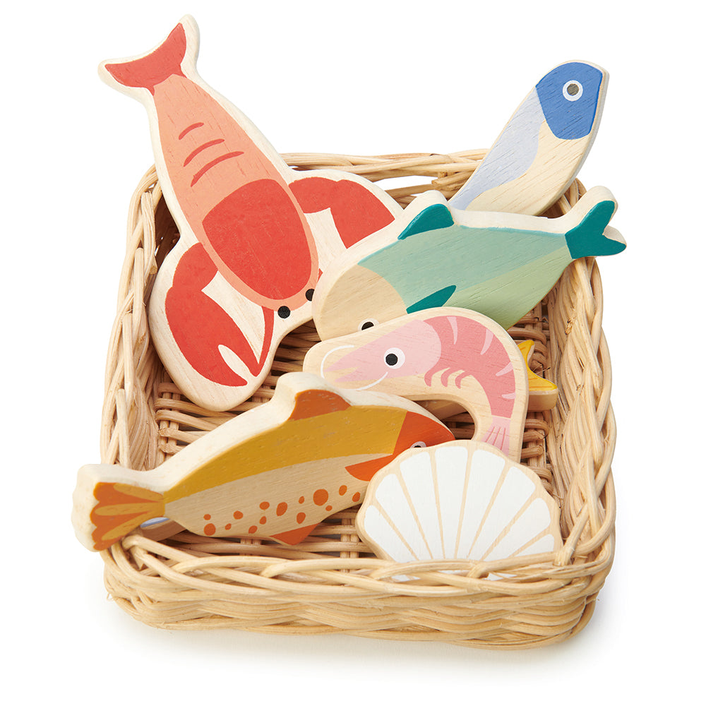 A hand crafted wicker basket with wooden lobster, plaice, mackerel, herring, whitebait, prawn and scallop. Part of our Market day Range and an accessory to our gorgeous Farmers Market.