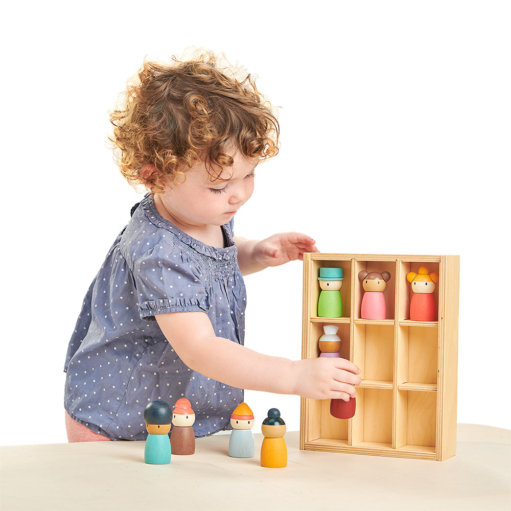 tender leaf wood toys completely plastic free and sustainable happy people hotel is an educational open ended play montessori shelf with 9 people from different ethnicities and ages. Teaches inclusivity to children and learning social skills through play.