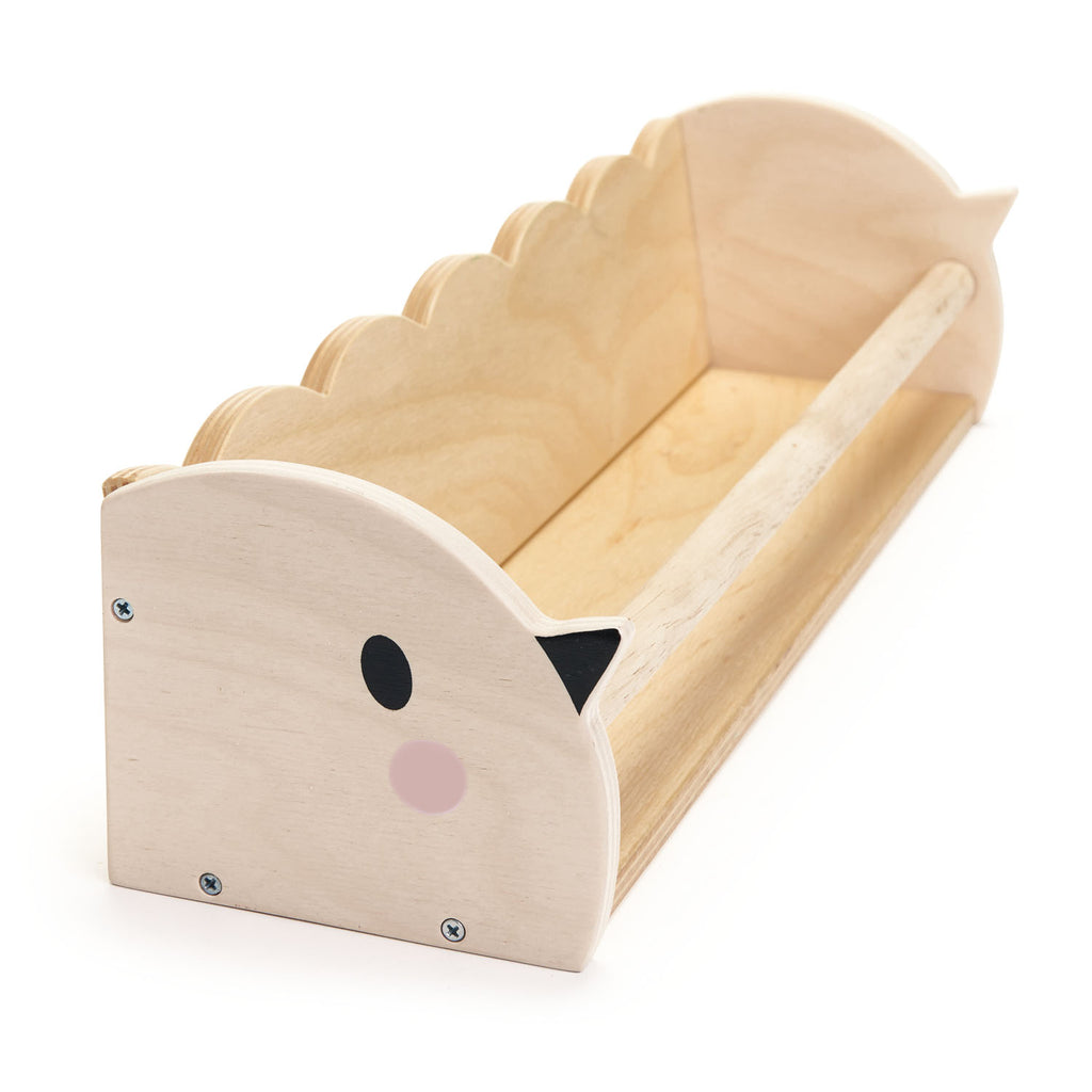 Tender Leaf Toys wooden shelf for a child's bedroom, with a birdie face on both ends and a front bar to hold a couple of books