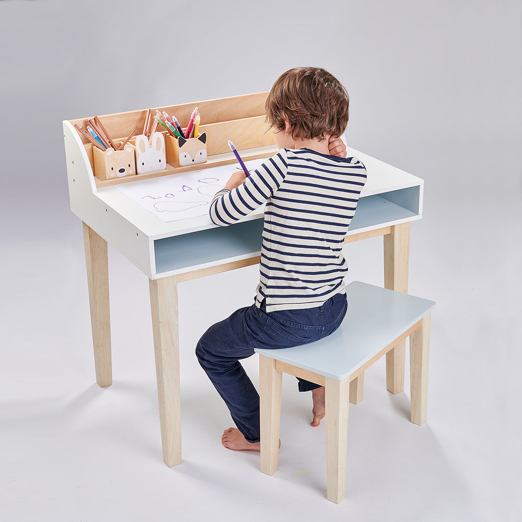 A plastic-free wood desk and chair for children for art and craft activities or homework includes pencil pot holders with animal faces